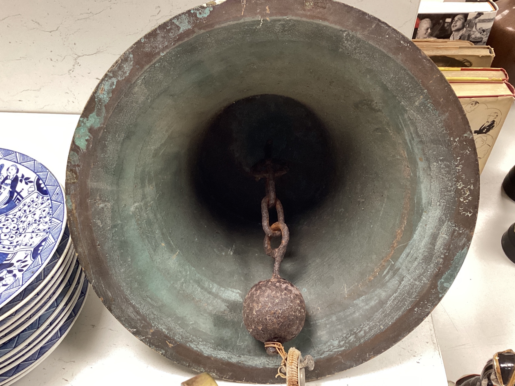 A ship's bell with brass bracket, salvaged from Chittagong ship yard between 1984-1989